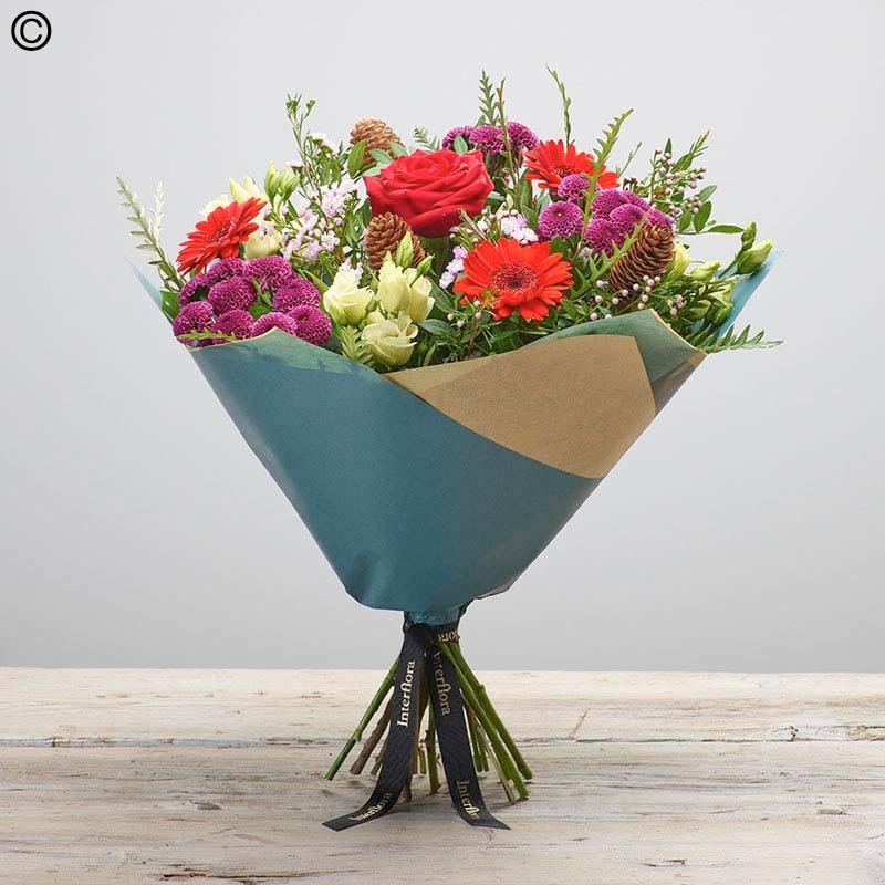 Christmas Florist Choice Hand tied   no lilies!